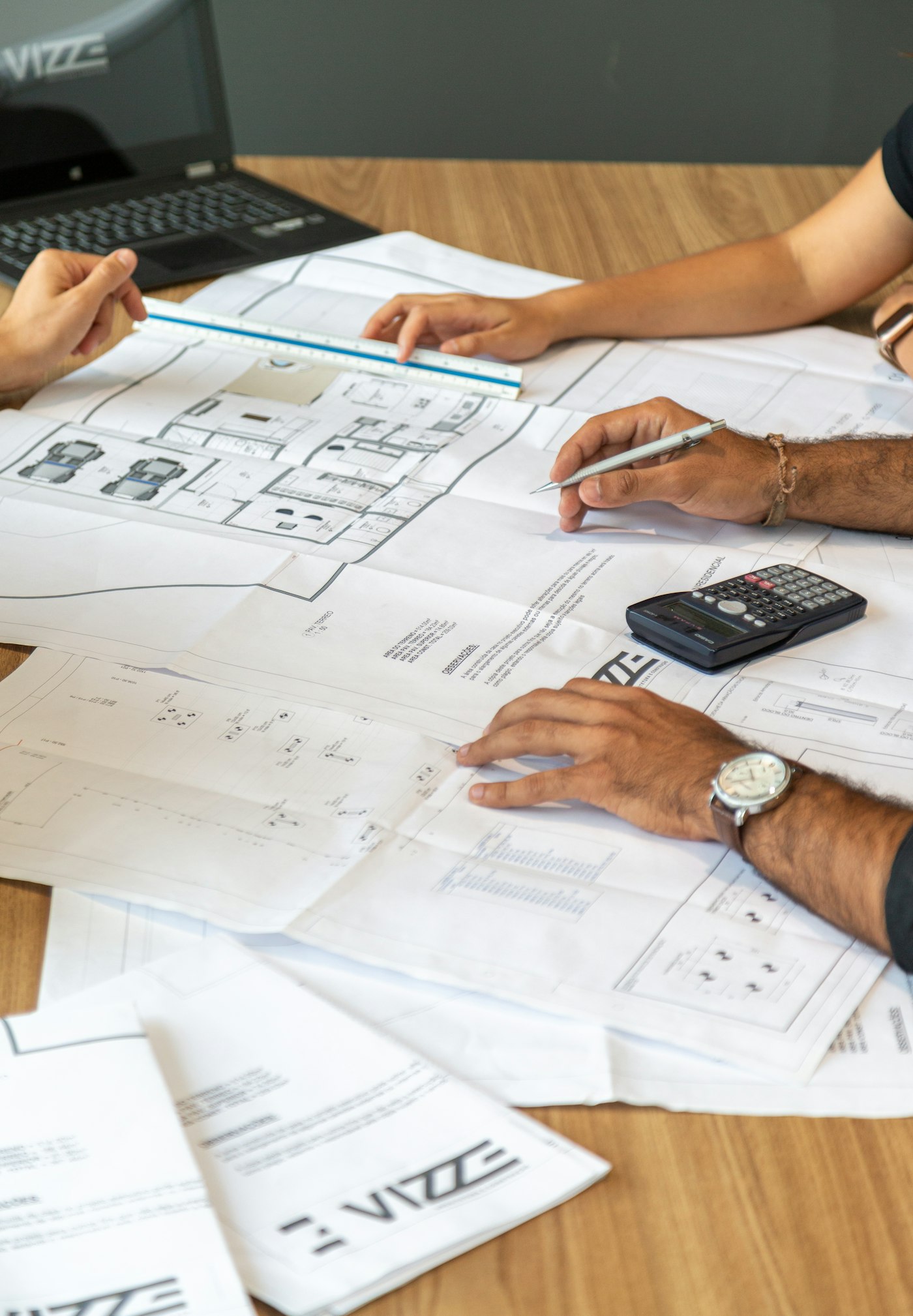 CFR Contracting team reviewing project plans